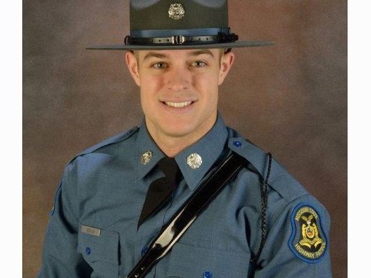 Flags fly at half-staff to honor fallen trooper