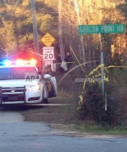 Authorities investigate a crime scene Friday, Feb. 5, 2016, in Milton, Fla. The search for a Missouri couple suspected in a series of robberies and abductions across the South ended in the Florida Panhandle early Friday. (AP Photo/Melissa Nelson-Gabriel)