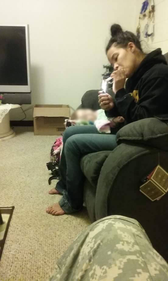 UPDATE: Woman pictured allegedly smoking methamphetamine while baby lies next to her