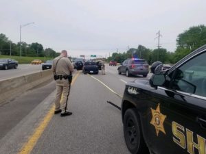 Photo Courtesy of Cass County Sheriff's Office. Deputies search suspect vehicle